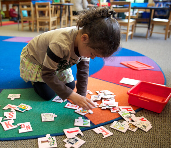 Child playing game in classroom