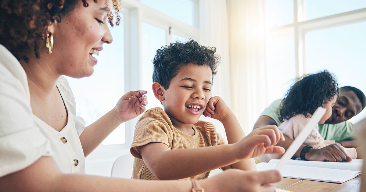 Teacher with young student