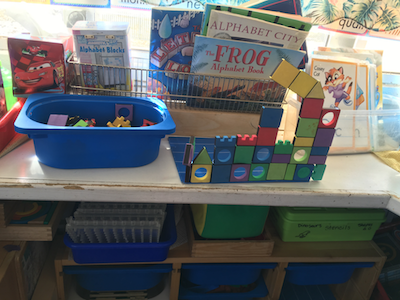 COW bus carries toys, books, and school supplies.