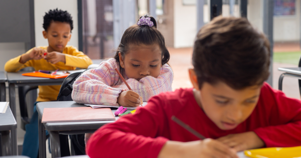 Students at their desks in the classroom