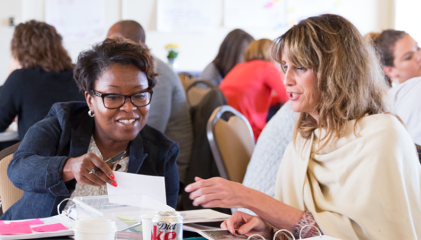 Two educators collaborate