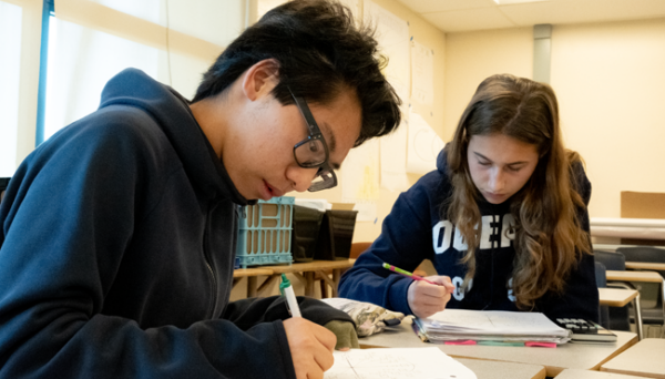 Two students doing math work