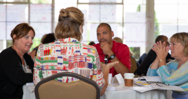 Adults working together